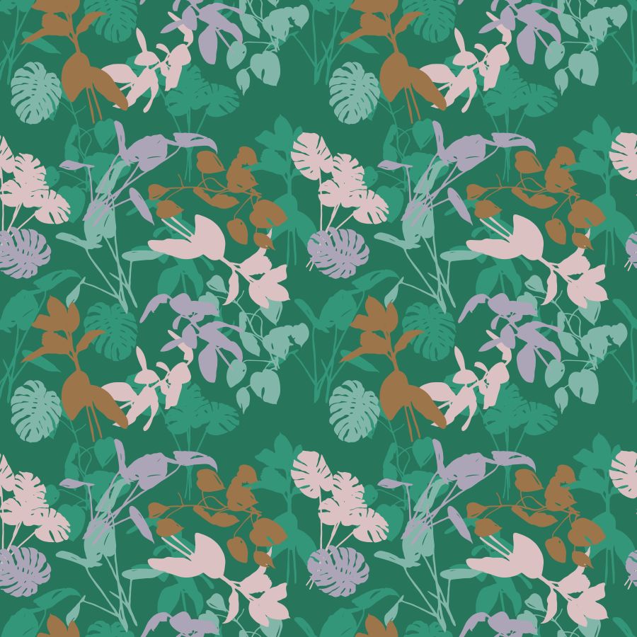 Wycinane egzotyczne liście na zielonym tle