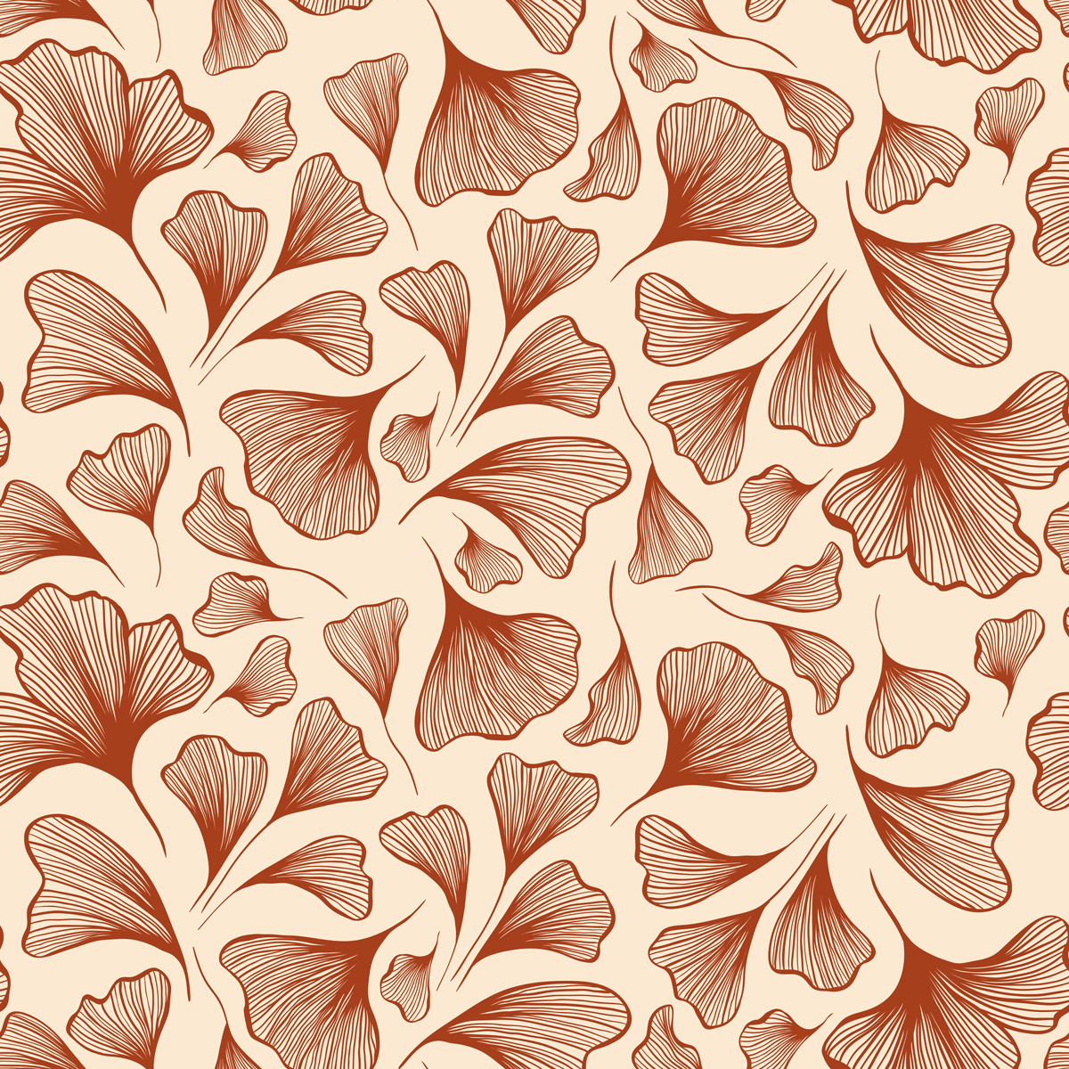 Ceglaste liście miłorzębu na beżowym tle