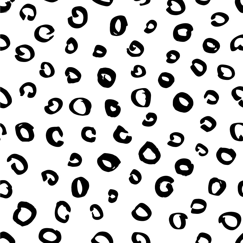 Czarne kółka na białym tle